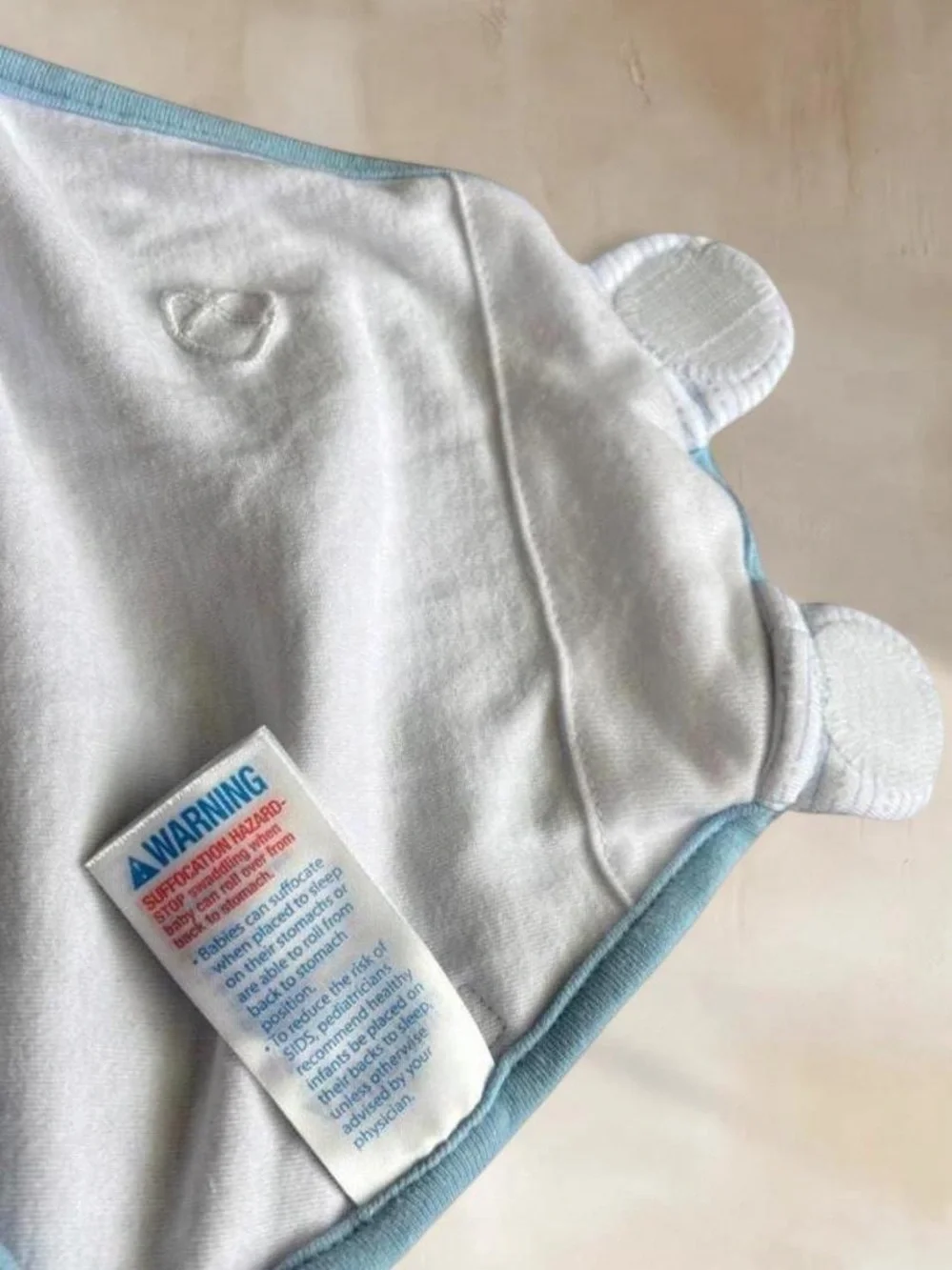 SwaddleMe Baby Sleep Sack Swaddle in White with Light Blue Trim